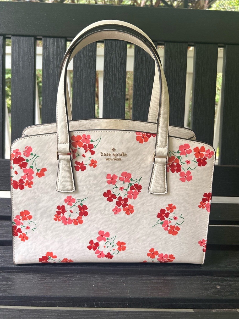 kate spade cream satchel with red and pink floral print